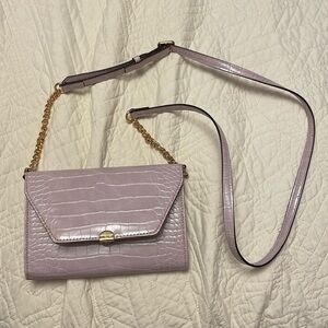 Got as a gift never used light purple Nine West Crossbody bag